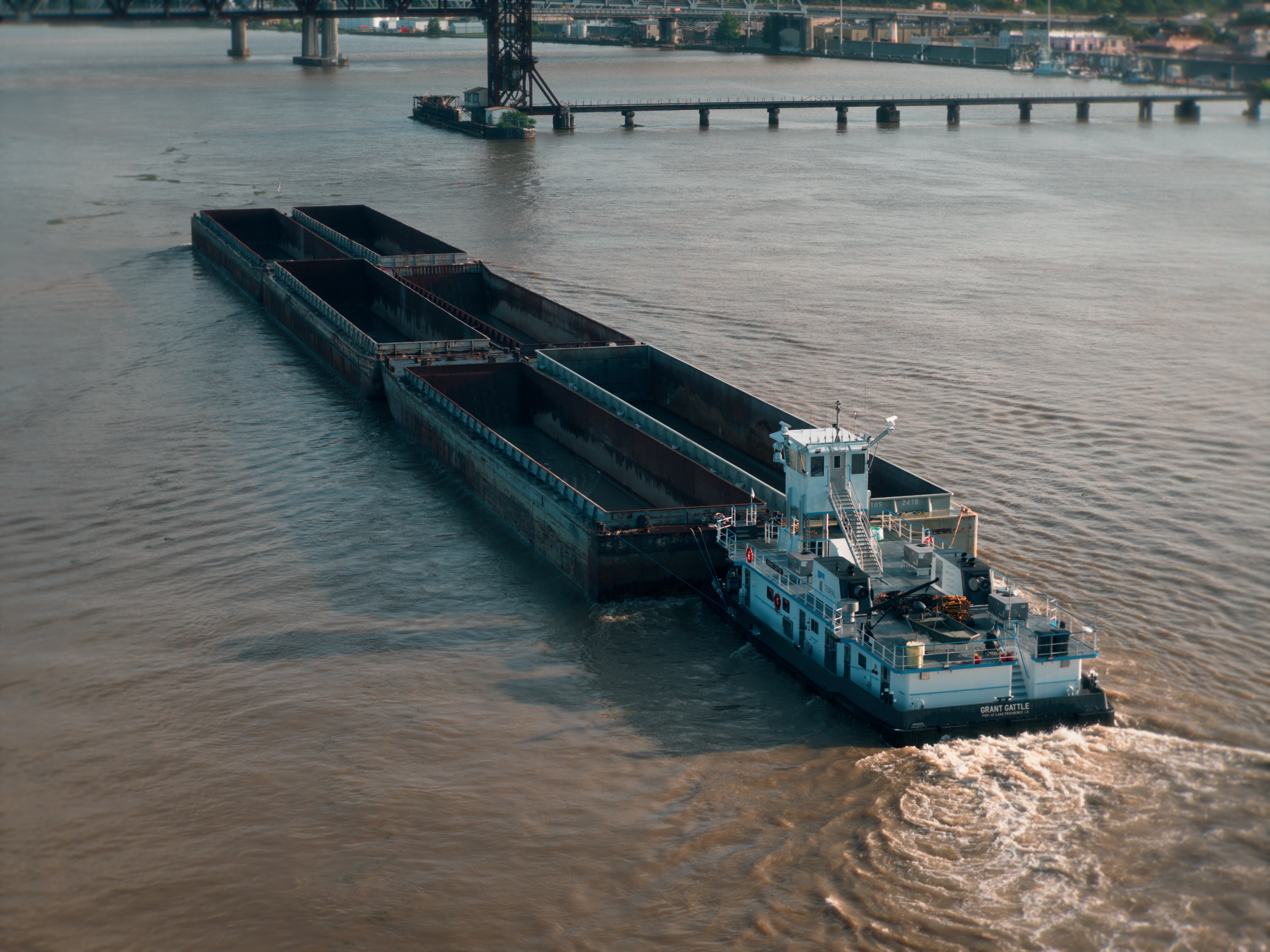 Tug Pushing Barges